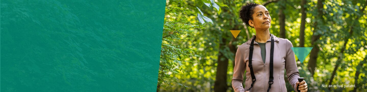 Middle-Aged Woman Hiking in the Forest LOKELMA FAQ Banner