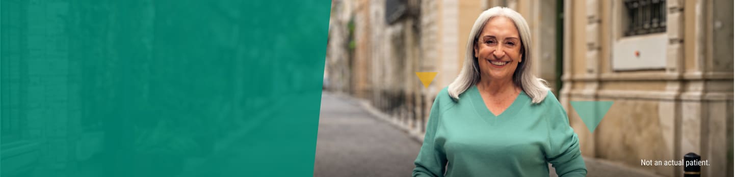 Smiling Older Woman with Long Gray Hair LOKELMA Support Program Banner